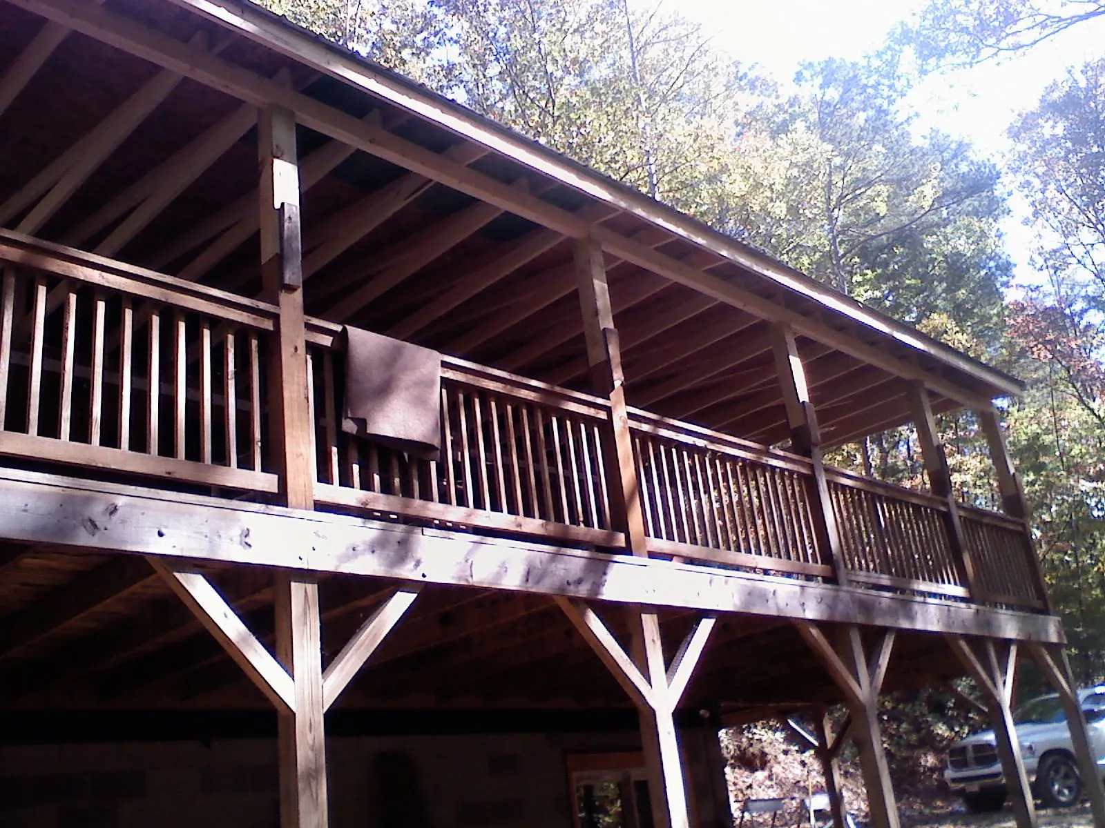 Timber framing under a new elevated porch and deck — Roof Leak Repair in Babylon by Roofing Brothers